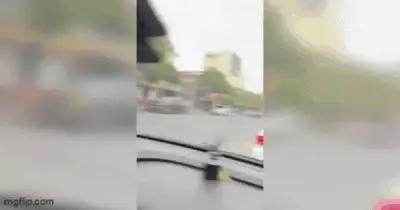 Bảo vệ chặn ô tô, cầm hung khí thách thức tài xế tại TP.HCM