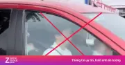 Hà Nội xử phạt tài xế ôtô bế trẻ nhỏ ngồi trước vô lăng khi lái xe