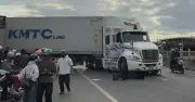 Tai nạn thảm khốc ở TPHCM: Xe máy bị cuốn vào gầm container, một người tử vong
