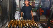 Xuyên đêm nướng nghìn con cá lóc kịp giờ đẹp cúng vía Thần Tài