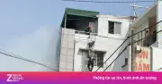 Cứu hộ đu thang dây giải cứu nạn nhân vụ cháy nhà ở TP.HCM