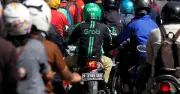 Indonesia giảm trần hoa hồng gọi xe, Grab và GoTo chịu áp lực