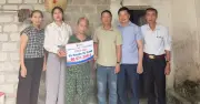 Người mẹ mang khối u nuôi con bại liệt được bạn đọc hỗ trợ hơn 90 triệu đồng