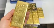 Phát hiện vàng và tiền giấu trong nồi cơm điện và sách rỗng tại Vũ Hán