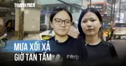 Mưa lớn bất ngờ đổ xuống TP.HCM, người dân và tiểu thương vất vả