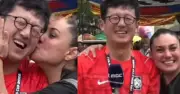 Phóng viên Hàn bị CĐV Mexico bất ngờ hôn má trong lễ hội World Cup