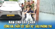 Xe lăn và đội quân hỗ trợ đưa thí sinh gãy chân vào phòng thi riêng