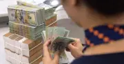 Lãi suất qua đêm liên ngân hàng giảm xuống 1,30%/năm, thấp nhất từ đầu năm