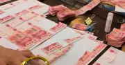Cụ ông 80 tuổi xé tiền tiết kiệm, ngân hàng ghép lại 18 ngày